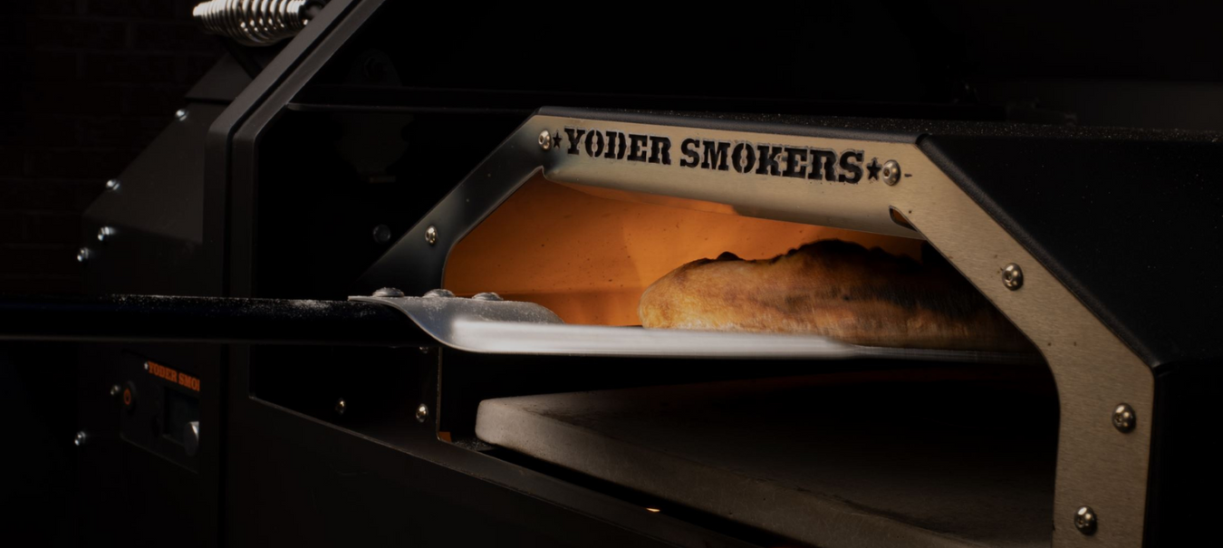 Yoder Smokers barbecue smoker with a pizza inside